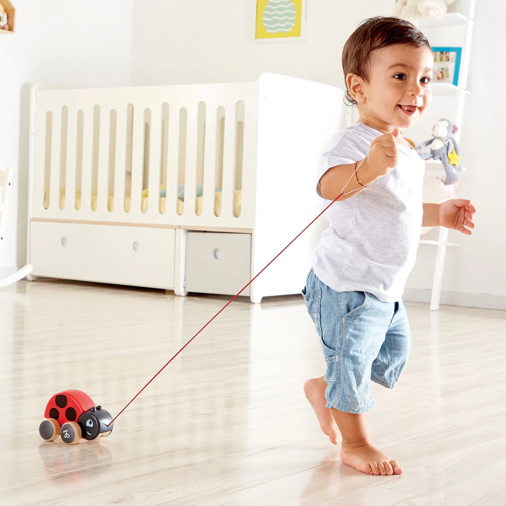 Hape Pull-Along Ladybug – Red & Black, Wooden Toy with Moving Wings - Image 3